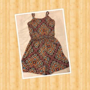 Patterned romper with see through detail
